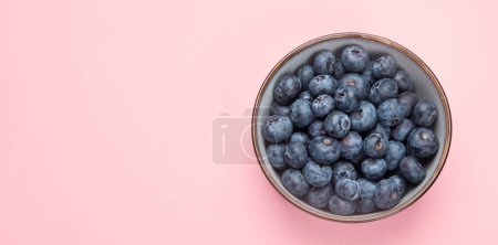 Photo for Blueberries on color background. Top view. - Royalty Free Image
