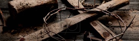Photo for Crucifixion Of Jesus Christ - Cross With Hammer Bloody Nails And Crown Of Thorns. Panorama, banner - Royalty Free Image