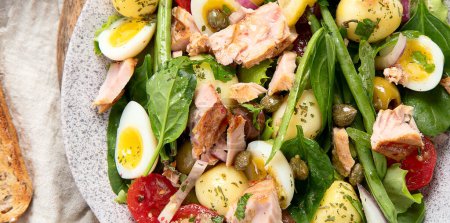 Photo for Ttraditional  Tuna salad, healthy mediterranen diet. Top view, panorama, banner - Royalty Free Image