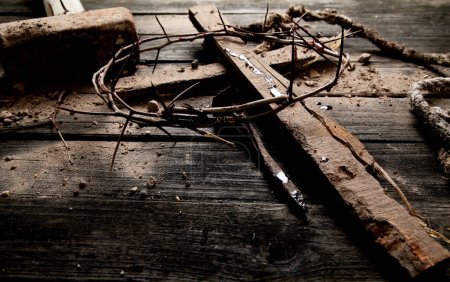 Photo for Crucifixion Of Jesus Christ - Cross With Hammer Bloody Nails And Crown Of Thorns. Top view. - Royalty Free Image