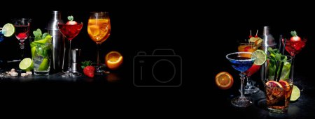Foto de Set of various colorful cocktails on black background. Classic long drink cocktails menu concept. Copy, space, panorama, banner - Imagen libre de derechos