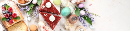 Photo for Easter desserts  table.  Sweet easter holiday concept with holiday decorations. Top view, copy space, panorama, banner - Royalty Free Image