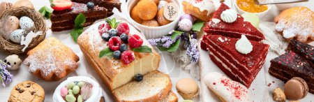 Photo for Easter desserts  table.  Sweet easter holiday concept with holiday decorations. Top view, panorama, banner - Royalty Free Image