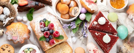 Photo for Easter desserts  table.  Sweet easter holiday concept with holiday decorations. Top view, banner - Royalty Free Image