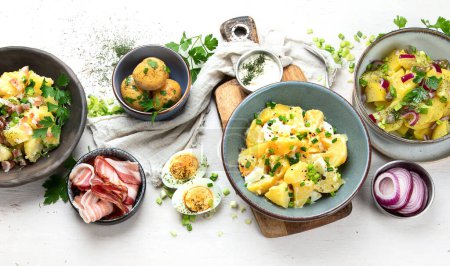 Photo for Set with different potato salads. Traditional german and american cuisine. Top view, flat lay - Royalty Free Image
