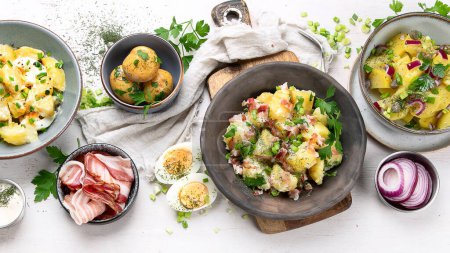 Photo for Set with different potato salads. Traditional german and american cuisine. Top view, flat lay - Royalty Free Image