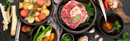 Photo for Beef and fresh vegetables for cooking, top view. Healthy and diet food concept on a dark background. Panorama, banner - Royalty Free Image