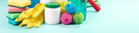 Photo for Cleaning products. Bottles, rubber gloves and cleaning sponge.  Cleaning supplies collection. Housework concept. Panorama, banner - Royalty Free Image