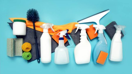 Photo for Cleaning products. Bottles, rubber gloves and sponge. Housework concept, top view - Royalty Free Image