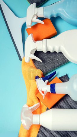 Photo for Cleaning products. Bottles, rubber gloves and sponge. Housework concept, top view - Royalty Free Image