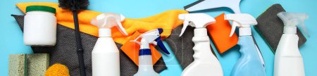 Photo for Cleaning products. Bottles, rubber gloves and sponge. Housework concept, top view	. Panorama, banner - Royalty Free Image