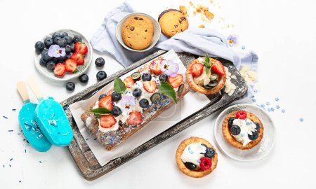 Photo for Dessert table. Top view, Summer cake with berries. Healthy dessert concept. top view, copy space - Royalty Free Image