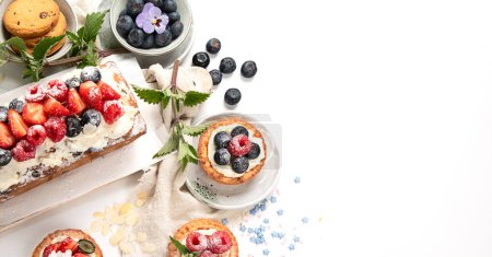 Photo for Dessert table. Top view, Summer cake with berries. Healthy dessert concept. top view, copy space - Royalty Free Image