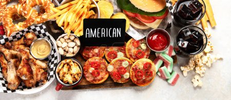 Photo for Fast food. American food on grey background. Top view, copy space - Royalty Free Image