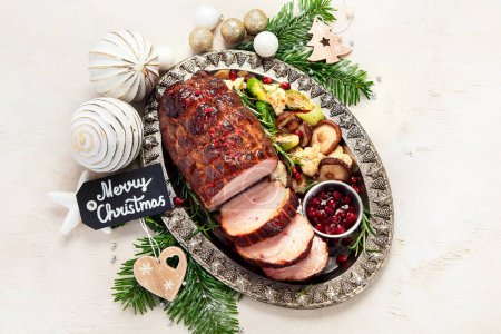 Photo for Christmas composition with baked ham on white background. Traditional food concept. Top view. - Royalty Free Image