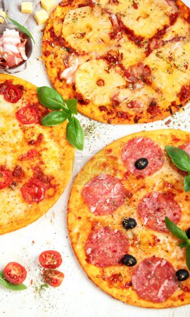 Photo for Different types of italian pizza on light background. top view, copy space - Royalty Free Image