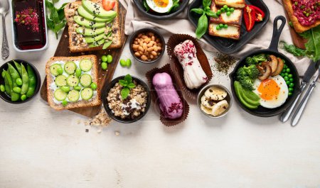 Photo for Healthy vegan food. Mushrooms, tofu, avocado and edamame beans. Top view, copy space, - Royalty Free Image