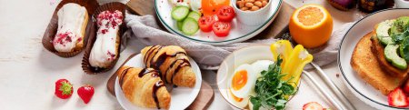 Photo for Healthy breakfast eating concept, various morning food on light background. Banner. Copy space. - Royalty Free Image