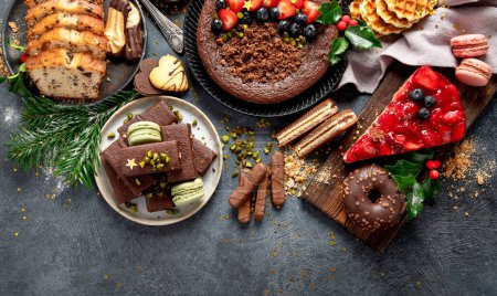 Photo for American Christmas sweets on dark background. Traditional food. Winter holidays concept. Top view, copy space. - Royalty Free Image