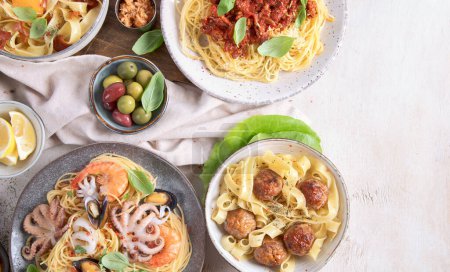 Photo for Assortment of Italian pasta dishes on light bachground. Traditional food concept. Top view, copy space - Royalty Free Image