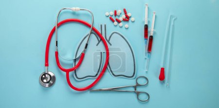 Photo for Lungs paper decorative model with medical stethoscope on blue background. World tuberculosis, pneumonia, respiratory diseases concept. Top view. Panorama. - Royalty Free Image