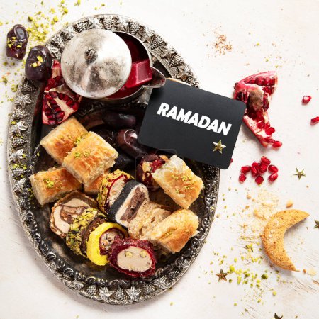 Photo for Traditional turkish, arabic dessert baklava assortment with pistachio. Ramadan sweets. Top view. - Royalty Free Image