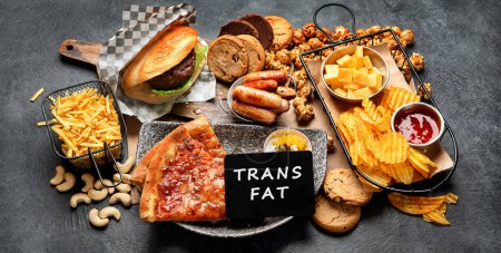 Photo for Fast food on a dark background. Junk food for your heart and skin. Trans fat concept. Top view, banner - Royalty Free Image