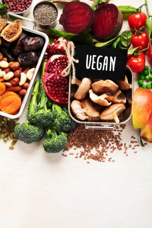 Photo for Vegan food rich of iron. Healthy eating. Vegetables, fruits and nuts. Copy space - Royalty Free Image