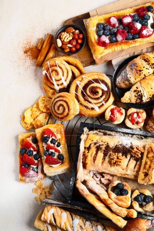 Photo for Sweet pastries on a light background. Top view - Royalty Free Image