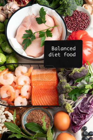 Photo for Balanced diet food background. Healthy food selection. Detox and clean diet concept. Foods high in vitamins, minerals and antioxidants. Anti age foods. Top view. - Royalty Free Image