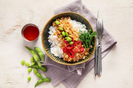 Photo for Vegan food. Soy meat, white rice, beans, red pepper on light wooden background. Top view - Royalty Free Image