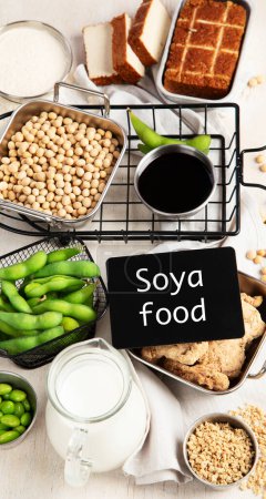Photo for Various soy products with soy bean, tofu, soy sauce and soy milk on a light background. Top view - Royalty Free Image