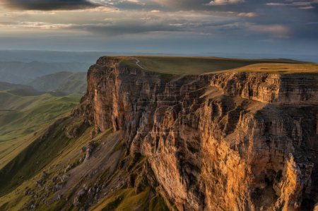 Aerial panorama view of plateau Bermamyt and hills at sunset, North Caucasus mountains, Russi