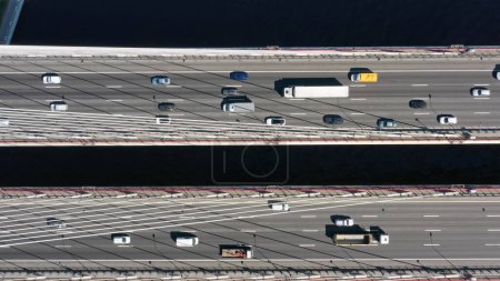 Aerial top view of cable-stayed bridge with cars in St.Petersburg