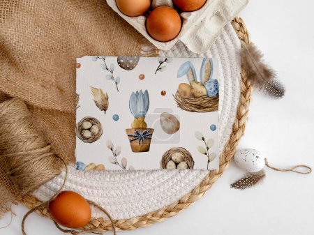 Téléchargez les photos : Easter mockup with traditional eggs and festive watercolor painting in boho style with bunny ears. Spring Christ holiday aquarelle drawing and fabric decor - en image libre de droit