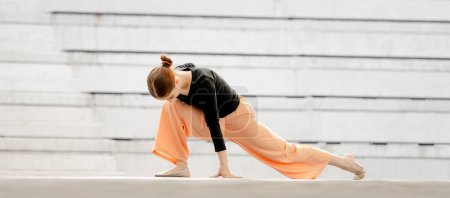 Teenage Girl Performs Contemporary Dance On Stage