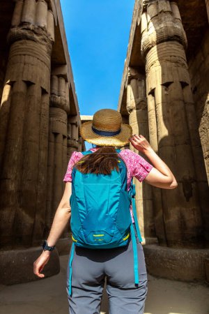 Woman tourist at Luxor Temple in a sunny day, Luxor, Egypt