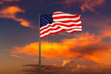 Photo for USA flag waving against sunset sky with beautiful cloud - Royalty Free Image