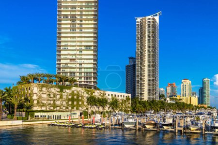 Photo for Boats docked near Residential buildings in Miami Beach in a sunny day, Florida, USA - Royalty Free Image
