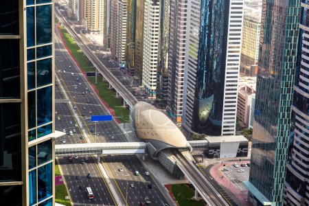 Téléchargez les photos : Aerial view of metro station in Dubai in a summer day, United Arab Emirates - en image libre de droit