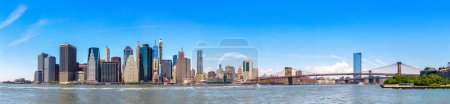 Photo for Panorama of Manhattan cityscape and Brooklyn Bridge in New York City, NY, USA - Royalty Free Image