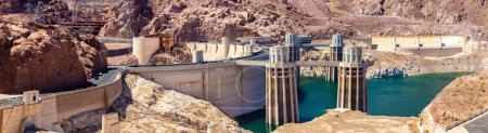 Photo for Panorama of Hoover Dam and penstock towers in Colorado river at Nevada and Arizona border, USA - Royalty Free Image
