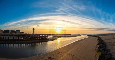 Photo for Panorama of Wooden Pier and Lighthouse in Trouville and Deauville in a beautiful summer evening, France - Royalty Free Image