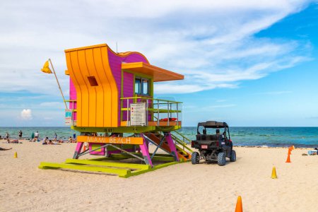 Photo for MIAMI BEACH, USA - MARCH 29, 2020: Lifeguard tower and a beach rescue car in South beach, Miami Beach in a sunny day, Florida - Royalty Free Image