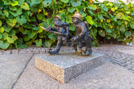 Photo for WROCLAW, POLAND - SEPTEMBER 21, 2022: Symbol of Wroclaw - Sculpture of dwarf (gnome) from fairy-tale in a sunny day, Wroclaw, Poland - Royalty Free Image