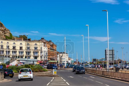 Photo for HASTINGS, THE UNITED KINGDOM - JUNE 25, 2022: Road along the Old town beach in Hastings, Sussex in a summer day, Hastings, The United Kingdom - Royalty Free Image