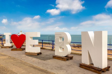 Photo for EASTBOURNE, UK - JUNE 29, 2022: I Love Eastbourne sign at Eastbourne beach in a sunny summer day, East Sussex, England, UK - Royalty Free Image