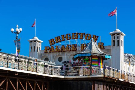 Photo for BRIGHTON, UK - JUNE 29, 2022: Brighton Pier at Brighton beach in a sunny summer day in Brighton, East Sussex, England, UK - Royalty Free Image