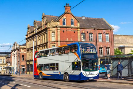 Photo for SHEFFIELD, UK - JUNE 16, 2022: Modern Double-decker bus in a sunny summer day in Sheffield, South Yorkshire, UK - Royalty Free Image