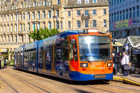 Photo for SHEFFIELD, UK - JUNE 16, 2022: Modern Supetram tram in a sunny summer day in Sheffield, South Yorkshire, UK - Royalty Free Image